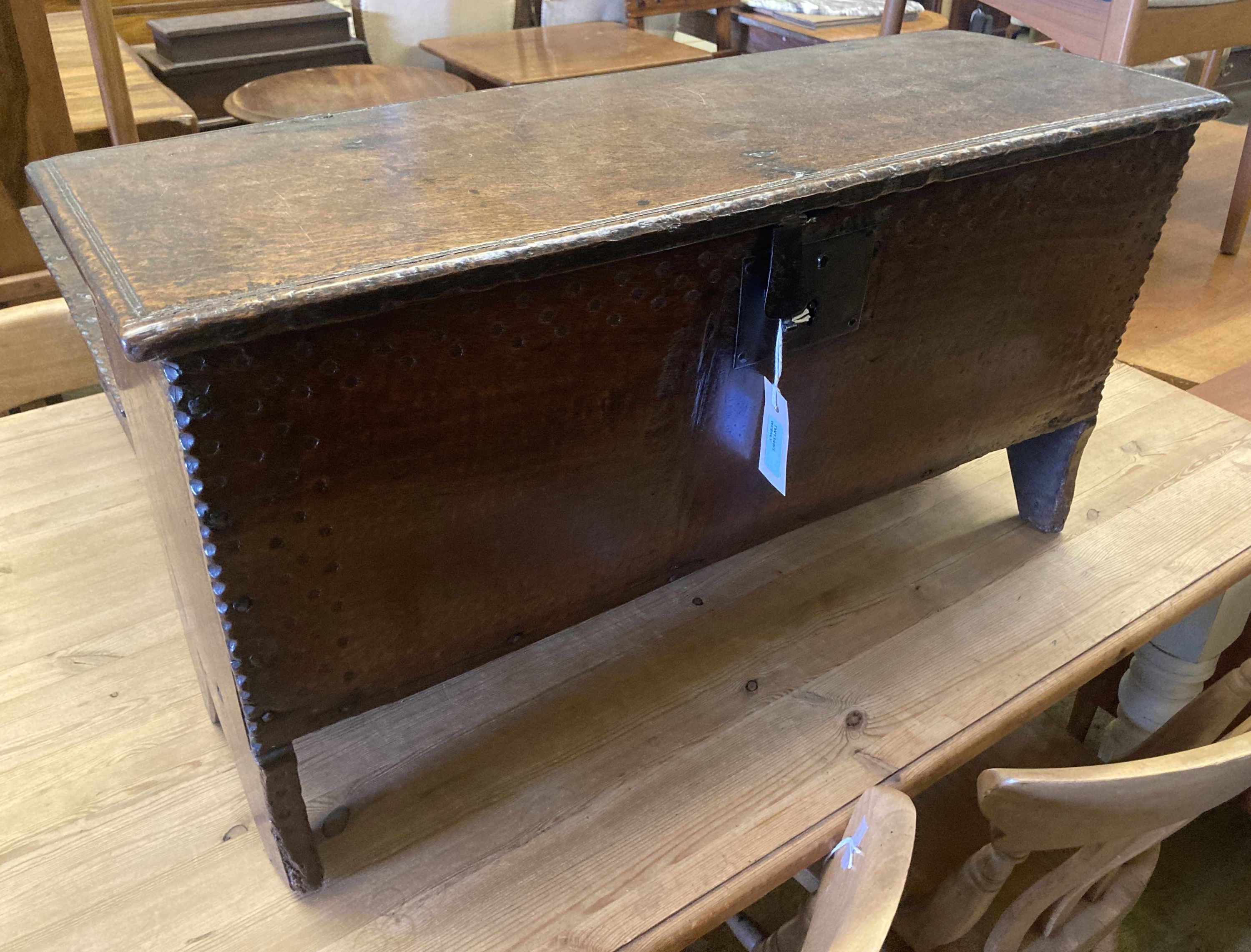 An 18th century oak six-plank coffer of small proportions, width 78cm, depth 29cm, height 42cm